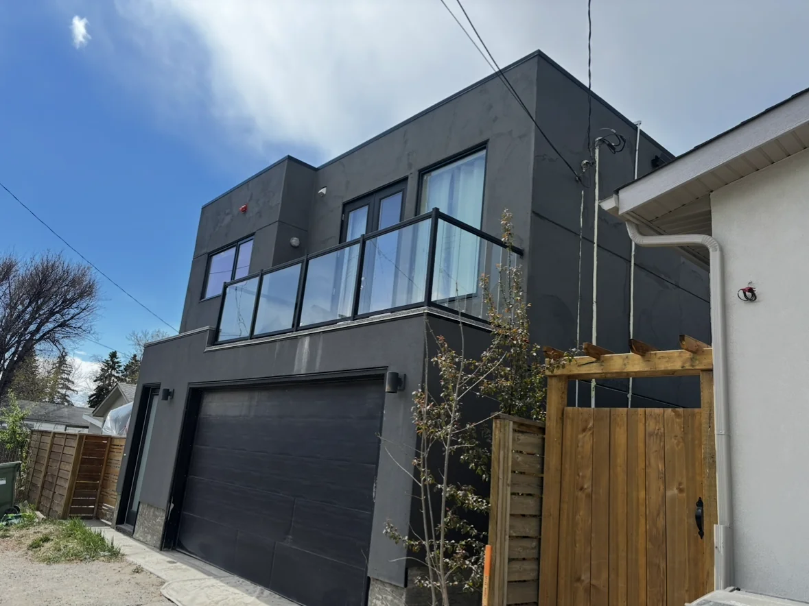 Calgary laneway suite in dark base coat before the acrylic finish