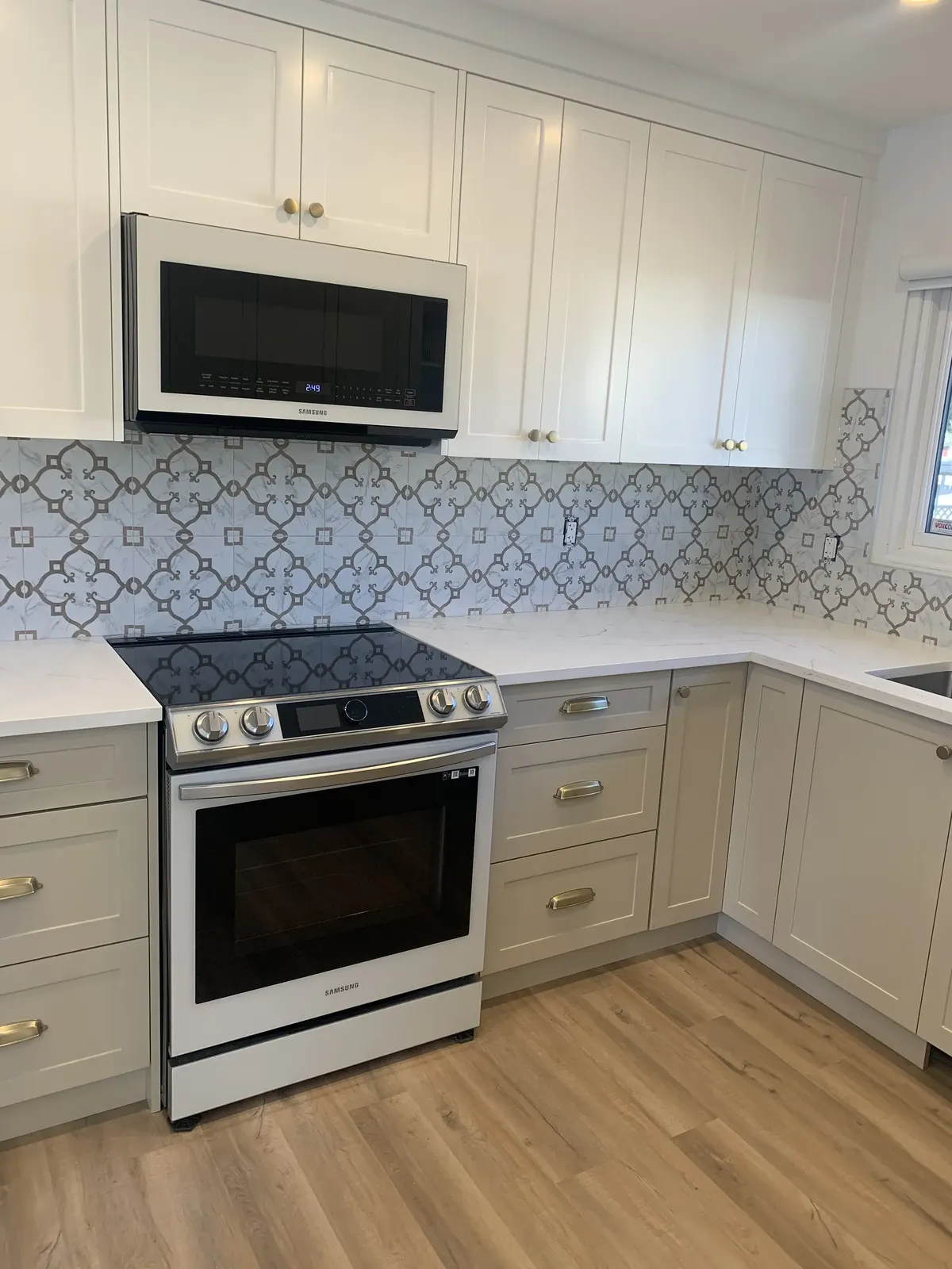 Calgary tile backsplash after — re-set tile and re-grouted joints