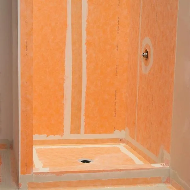 Schluter Kerdi waterproofing membrane installed behind tile in a Calgary custom shower